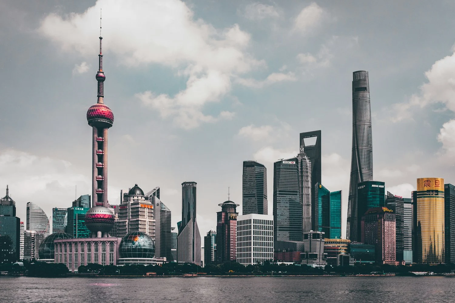 The Oriental Pearl Tower and Lujiazui buildings beside the Huangpu River